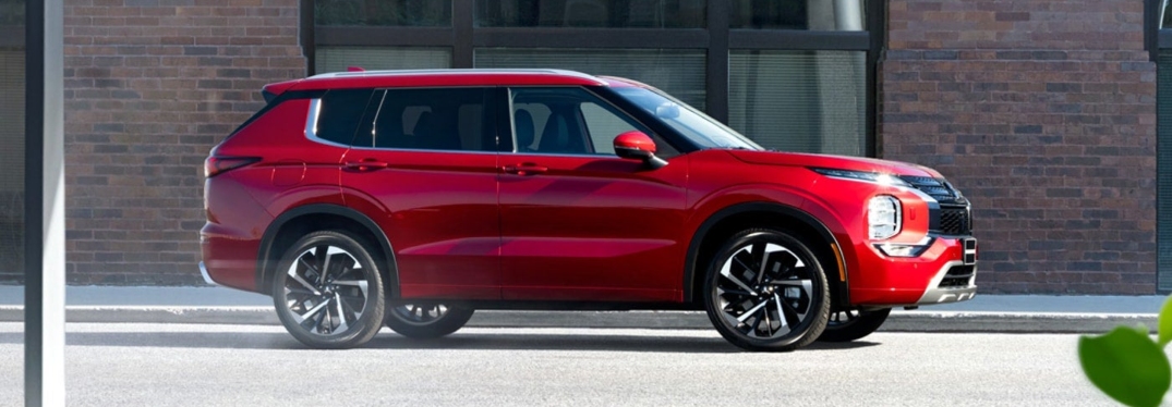 Red 2024 Mitsubishi Outlander SUV Parked on Street