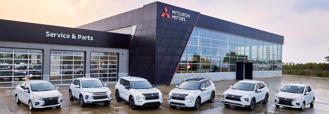 2024 Mitsubishi Lineup of Vehicles in Front of Dealership