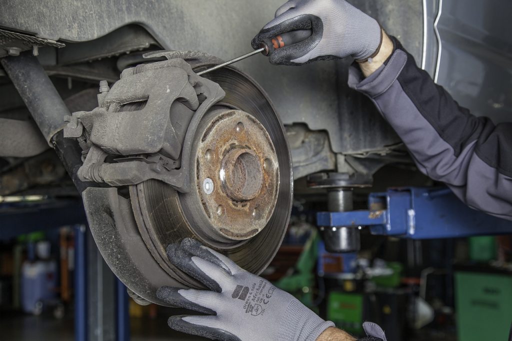 A old brake system being worked on by a Mitsubishi mechanic in Hayward, CA 