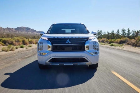 Front View of White 2024 Mitsubishi Outlander Plug-In Hybrid SUV